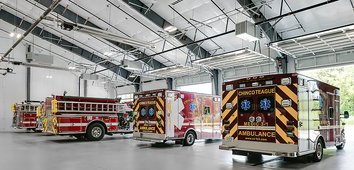 Fire department vehicles inside Butler Building.